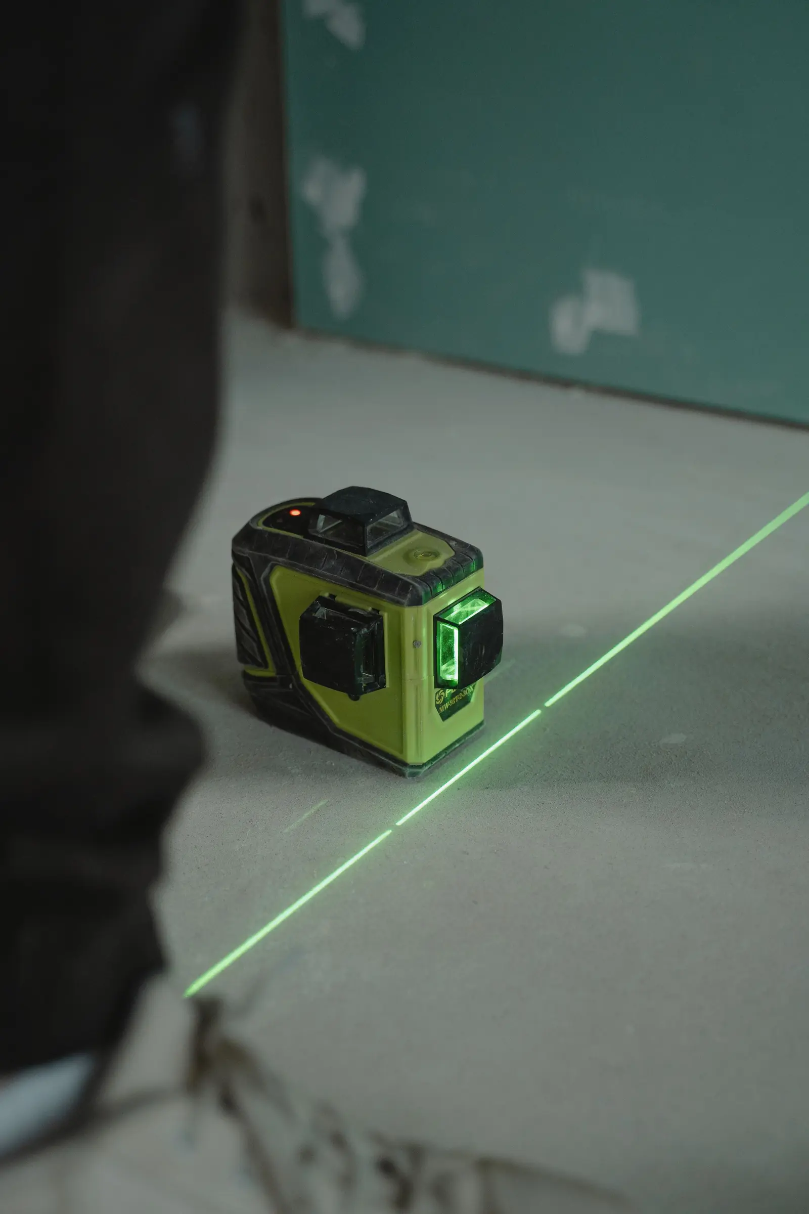 Line laser projecting onto a concrete floor