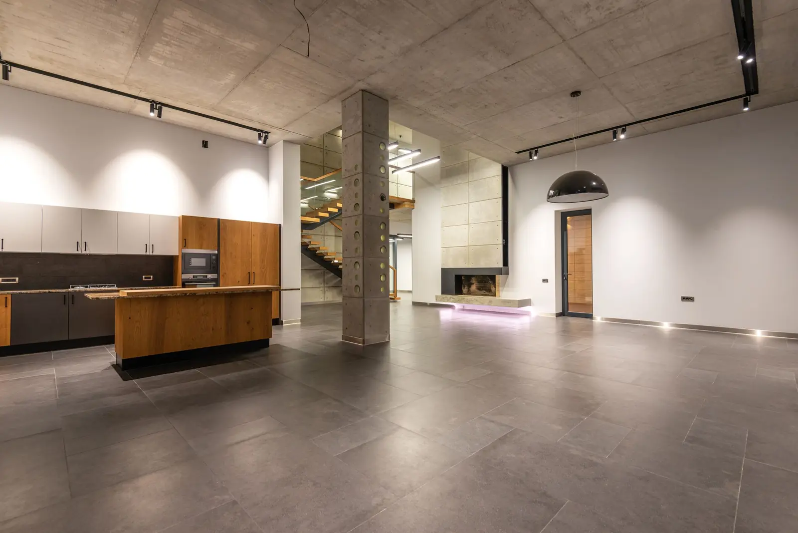 Modern open-plan home with a polished concrete floor
